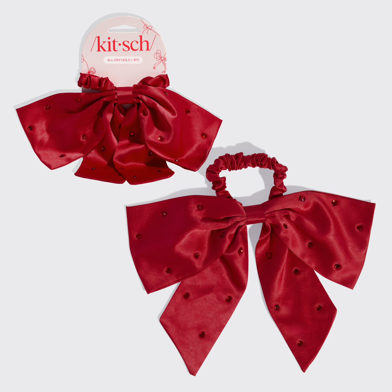 503677-Satin_RhinestoneBowScrunchie-SeasonalCollection-Red-Hero-1280x1280px_2121a4a9-4ed7-4481-9fe4-a357e55c0f32